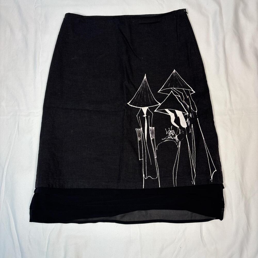 Black skirt with white graphic and sheer hem
